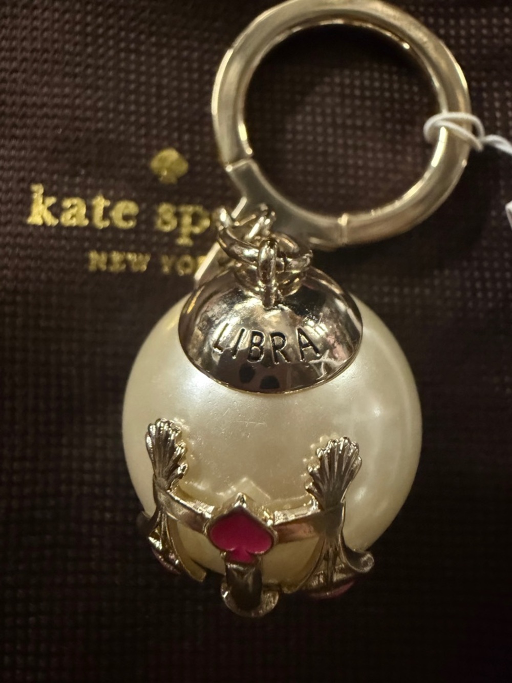 kate spade Gold-Tone Pearl Libra Charm Keyring with Pink Accents